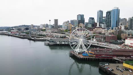 A-fly-by-drone-shot-of-The-Great-ferris-Wheels-in-Seattle,-Washington-in-United-State-of-America