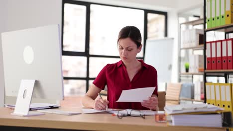 Woman working at her desk in the office