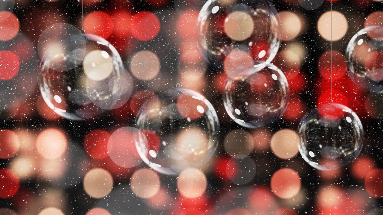 크리스마스 보블 위에 내리는 눈의 애니메이션