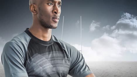 Animation-of-african-american-male-rugby-player-holding-ball-over-stadium
