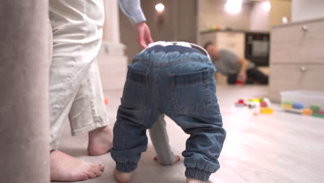 baby sitting on the floor looking at camera