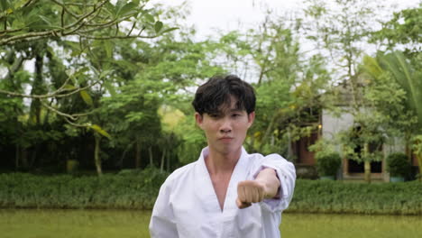 young man practising taekwondo