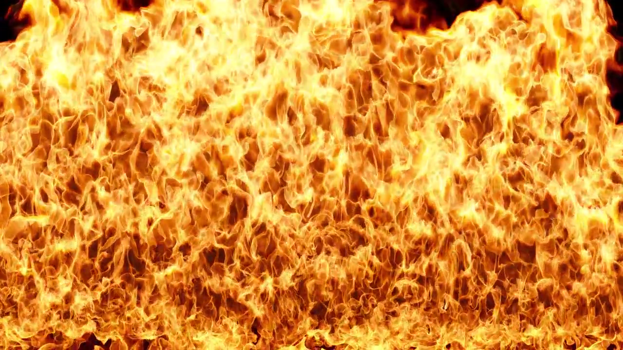 Flammende brandanimation på sort baggrund, uendelig løkke, flammer stiger i slowmotion