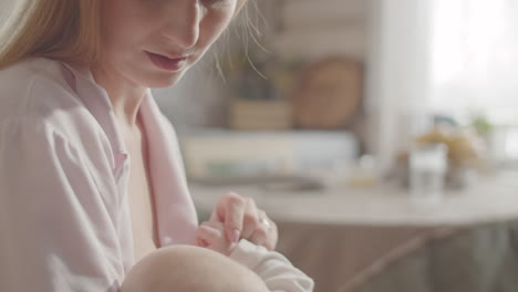 mother breastfeeding baby