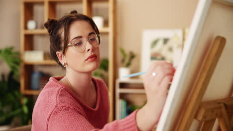 woman painting at home