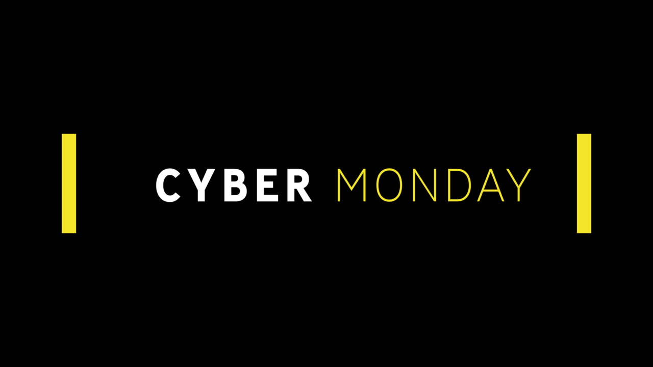 texto blanco y amarillo de cyber monday que aparece contra la pantalla negra 4k