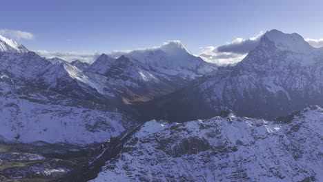 aerial view of daocheng yading, sichuan, china in yellow leave season. three sacred mountains