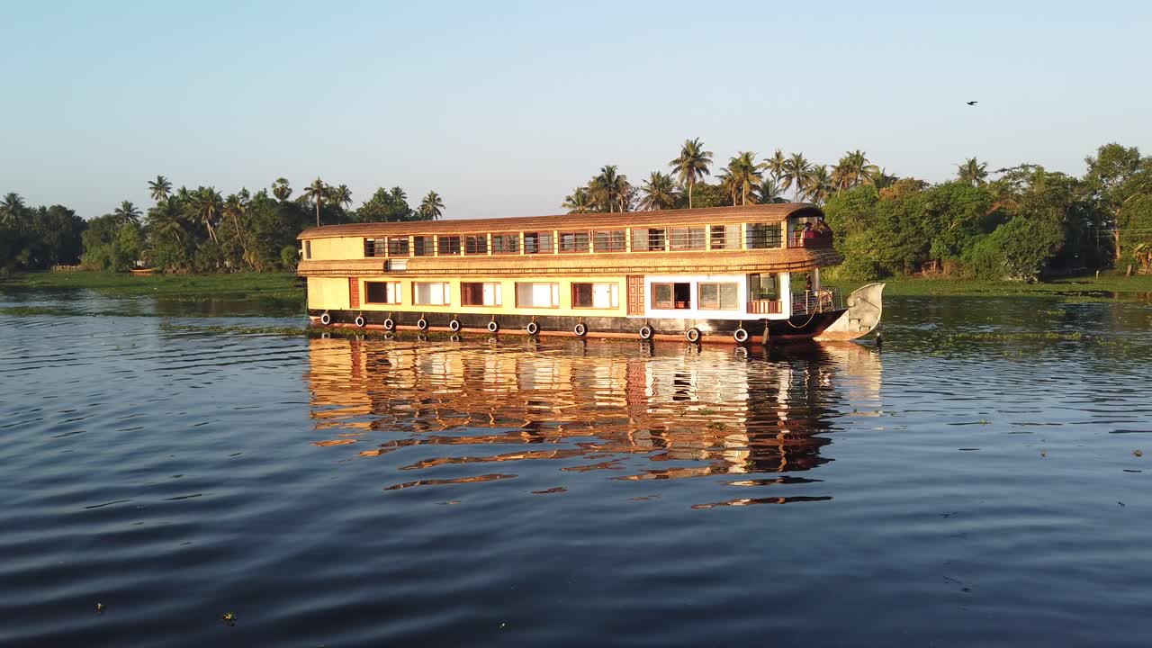 Traditional Wooden Houseboat on Canal Waterway at Alappuzha, Kerala, India.