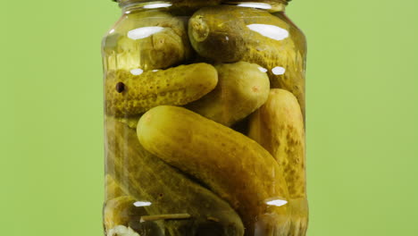 pickled cucumbers in a glass jar