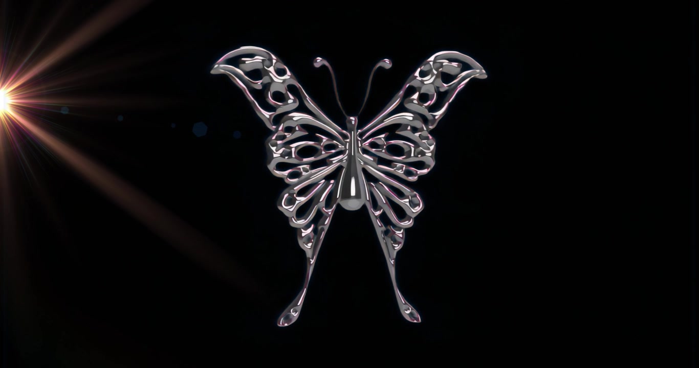 Lens flare streaming left illuminating silver metallic butterfly ornament showcasing contrast view