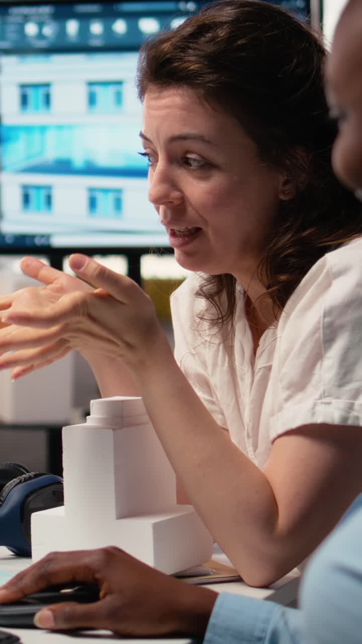 Vertical Video Professional female team working with architectural measurement software
