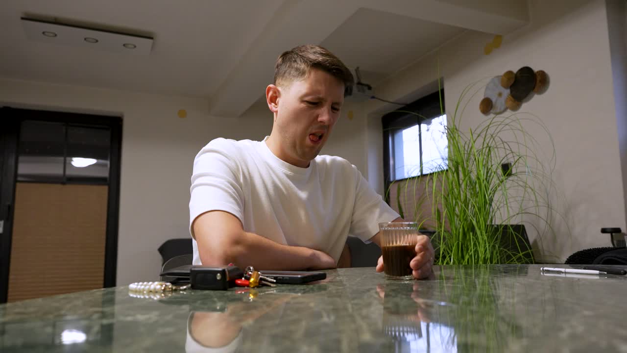 Man Disgusted by Burnt Coffee Smell. Close Up