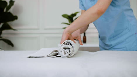 physiotherapist preparing the massage room