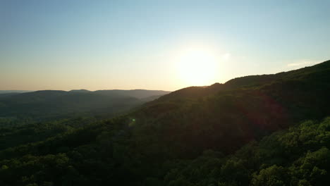 Drone-Shot-over-bulgarian-village-into-hills-and-woods-03