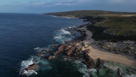 coast and beach of margaret river, western australia. aerial forward and slow-motion