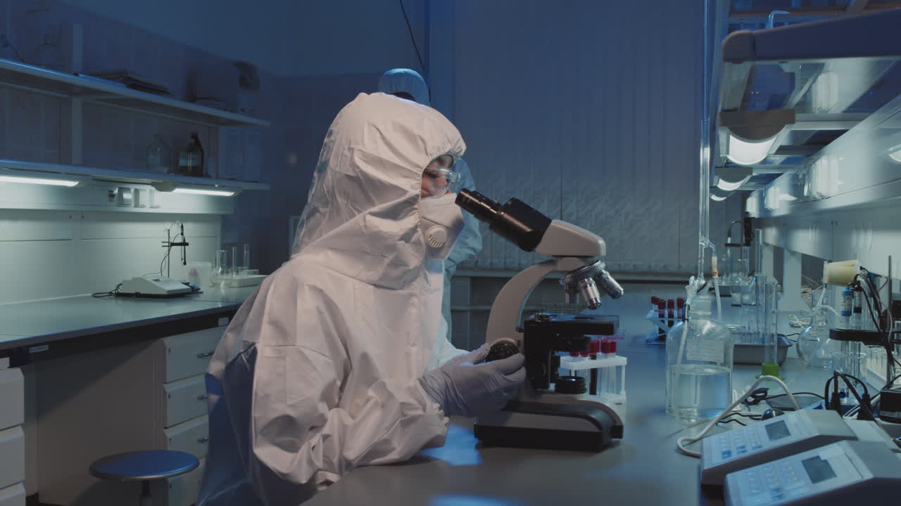 Female Epidemiologist Working in Lab and Posing