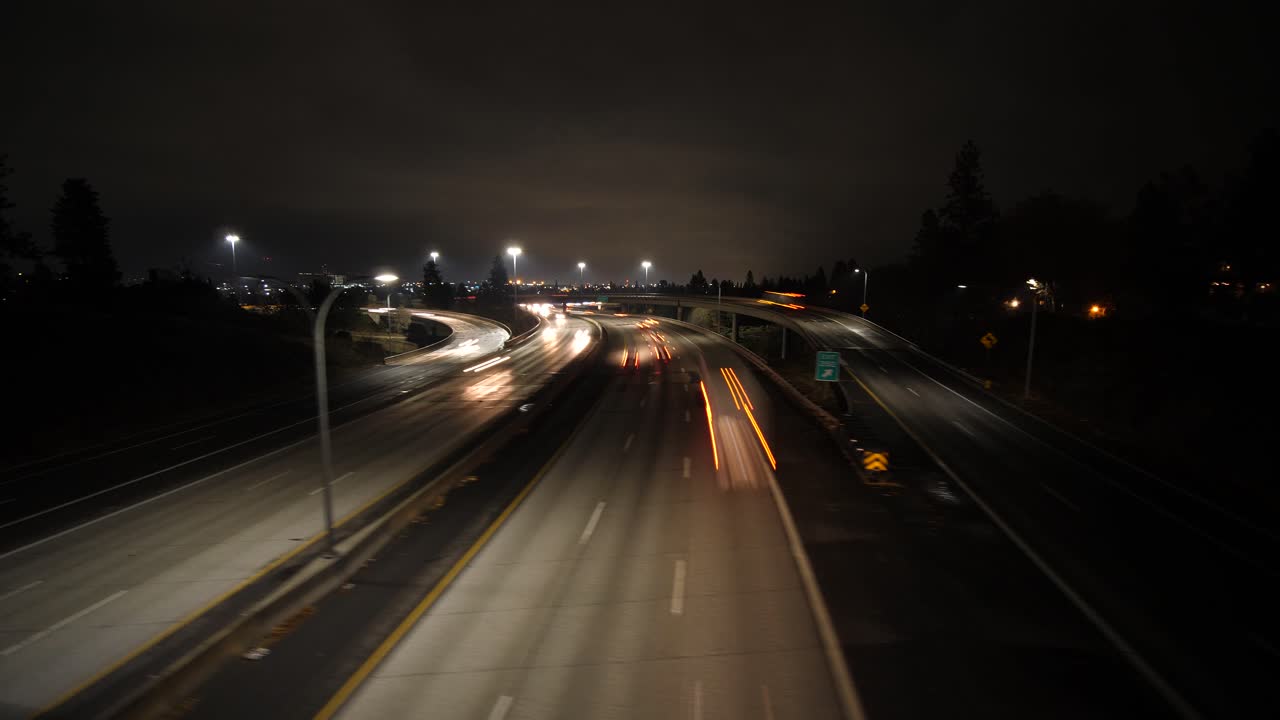 Moving hyperlapse of freeway at night with cars and traffic timelapse ...