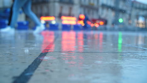 montpellier place de la comedie rainy day raindrops on pavement france
