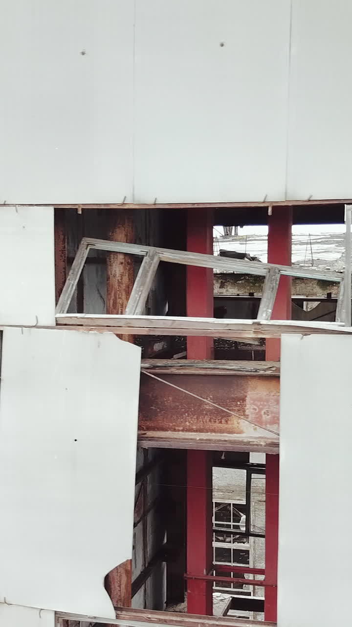 Abandoned chemical plant. Old industrial building for demolition. Aerial view. Vertical video