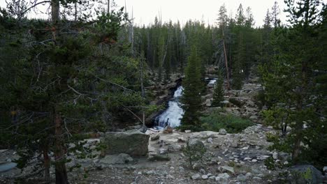 wide shot of the beautiful provo falls waterfall in the uinta wasatch cache national forest in utah on an overcast evening