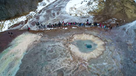 strokkur geyser at geysir hot springs in iceland during winter