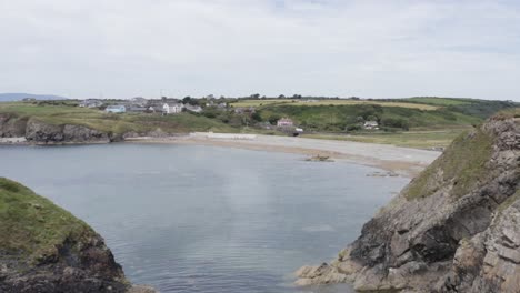 low ocean aerial approaches annestown pebble beach, southern ireland