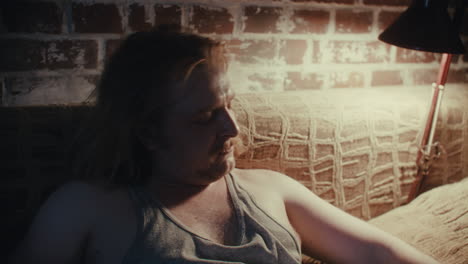 man in distress on couch