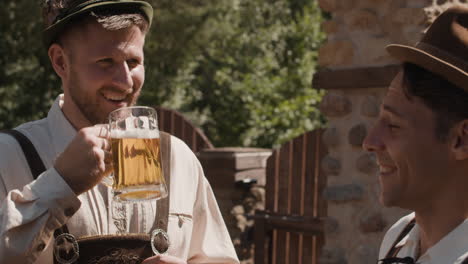 men celebrating oktoberfest with beer