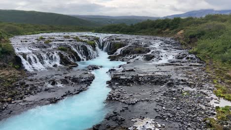 Bluest-water-of-Iceland-in-Bruarfoss-waterfall,-view-from-above