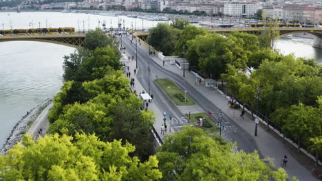 aerial - flying over the avenue on margaret island, danube river, budapest, hungary