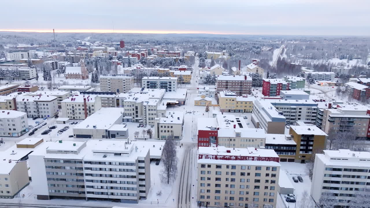 Aerial View of a Snow Covered City in Winter