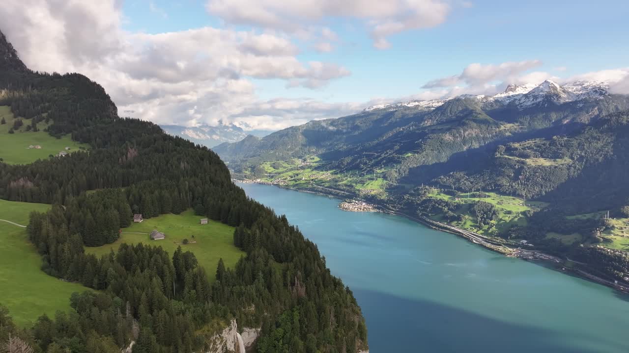 A stunning aerial view over Lake Walensee, showcasing the Swiss mountain range and the surrounding natural landscape in all its splendor.