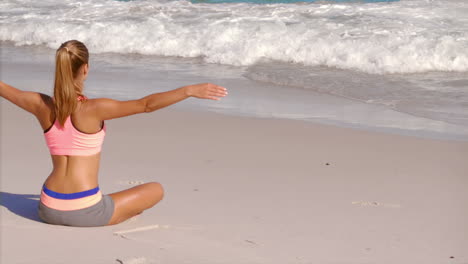 Attractive-blonde-woman-doing-yoga-