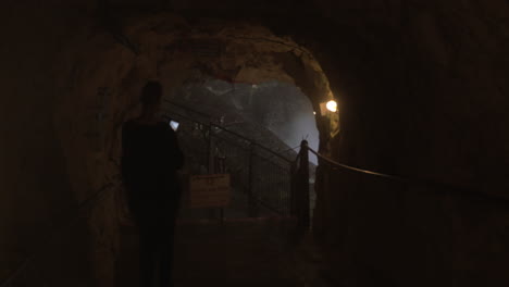 Woman-visitor-taking-cell-photos-at-Rosh-Hanikra