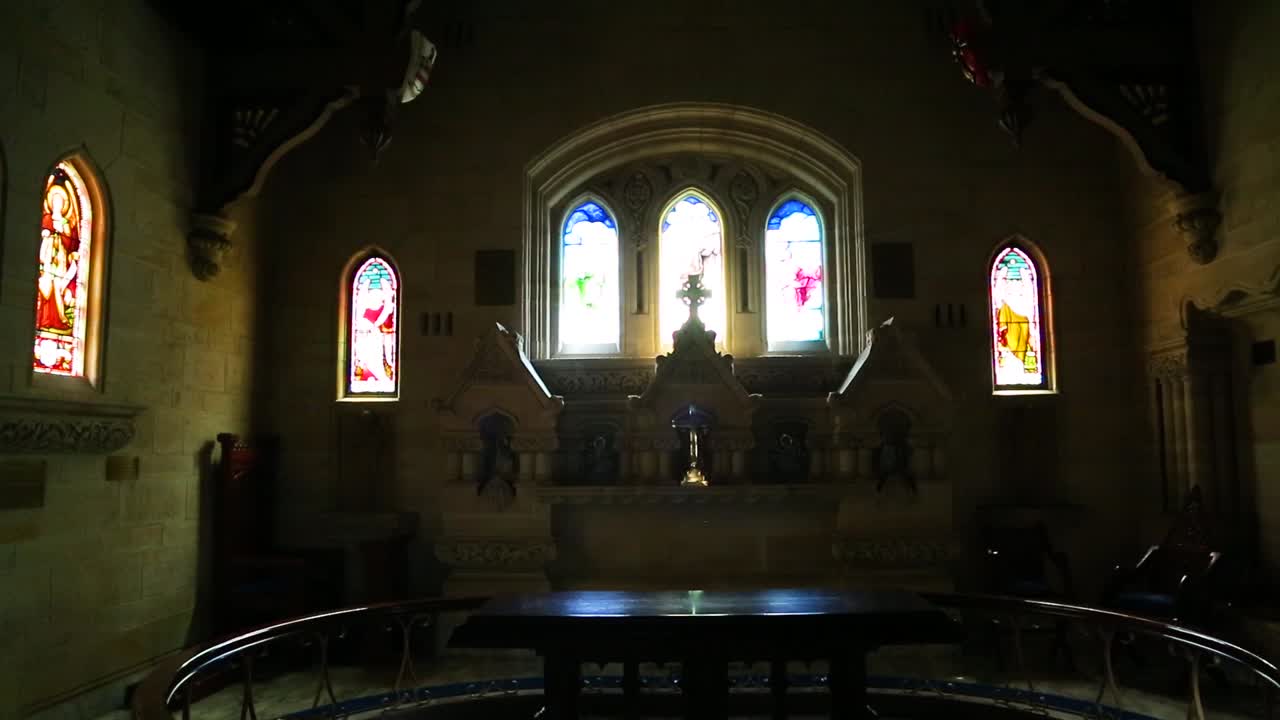 altar of an old modern anglican church, dark