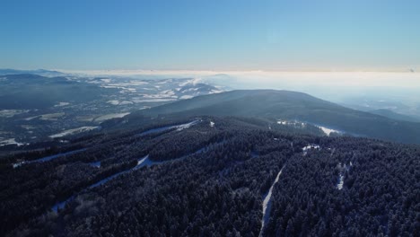 Aerial-drone-view-of-winter-landscape-in-Jizera-mountains,-Liberec-region,-Czech-Republic