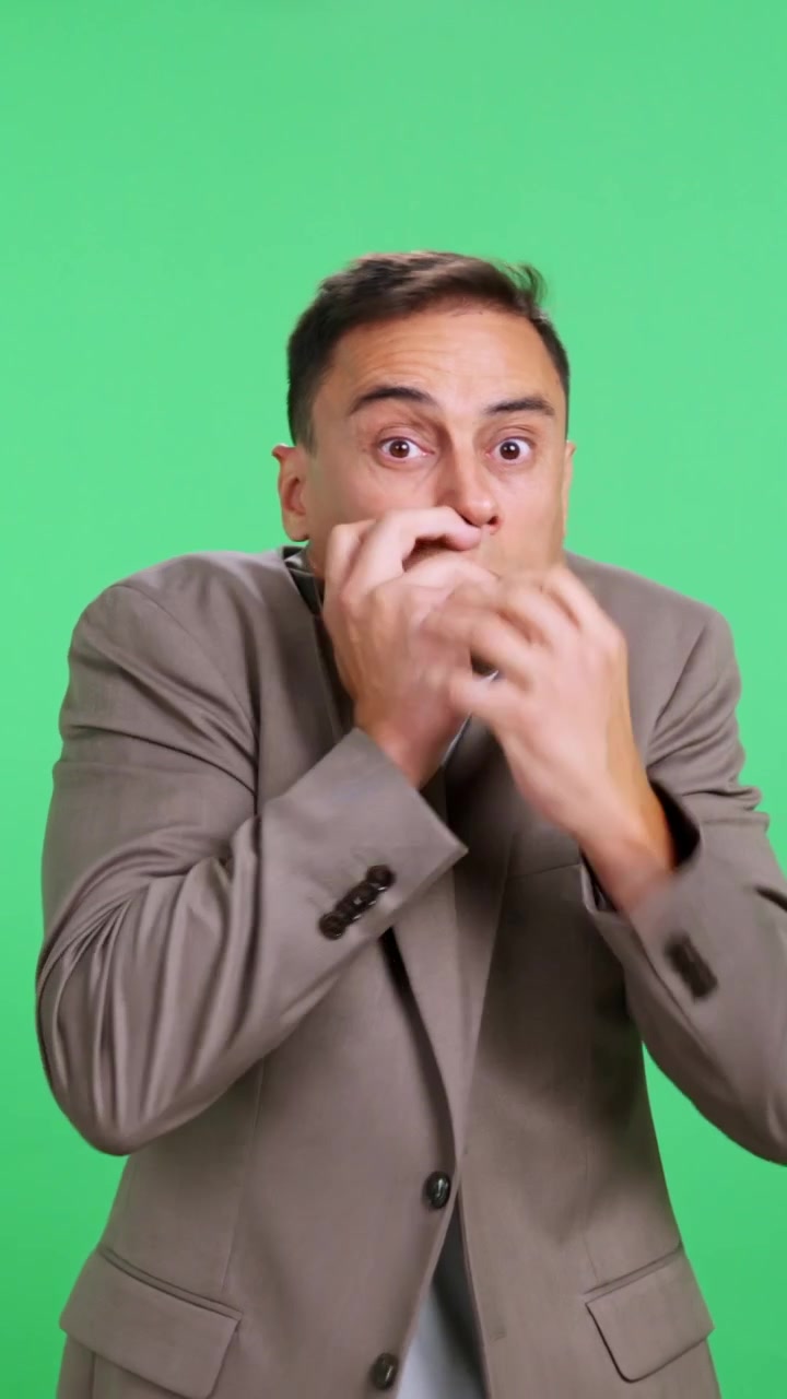 Scared businessman showing fear and anxiety