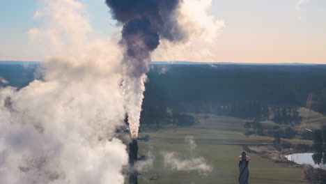 Air-pollution-from-hazardous-carbon-emissions-at-industrial-power-plant,-aerial