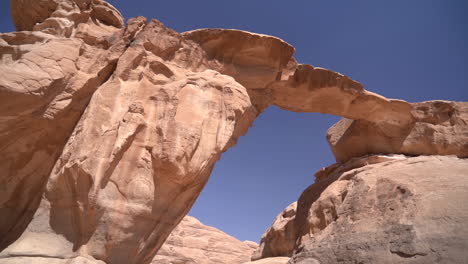 sandstone arch, natural wonder of wadi rum, jordan, low angle panorama