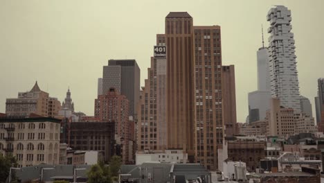 aerial moving shot of new york city with big buildings and skyscrapers. cityscape of urban city.