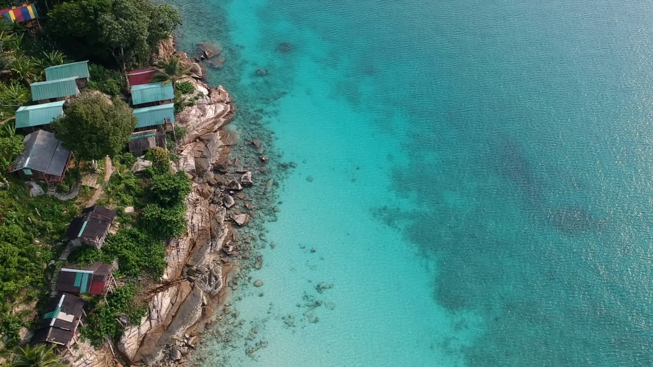 Paradise beach turquoise water perhentian island Malaysia costal rocks Drone