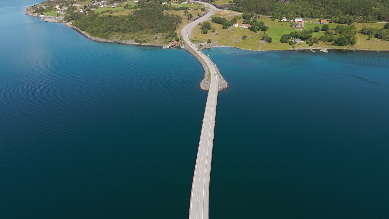 Atlantic Ocean Road bridge across Fjord with clear blue and turquoise sea water at Kristiansund, Norway, Scandinavia.