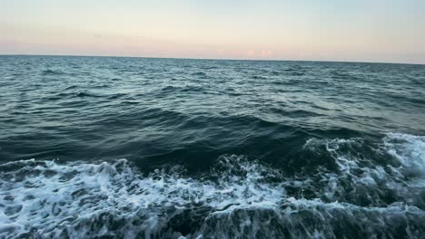 waves splashing -on a boat ride to the open ocean -slow motion