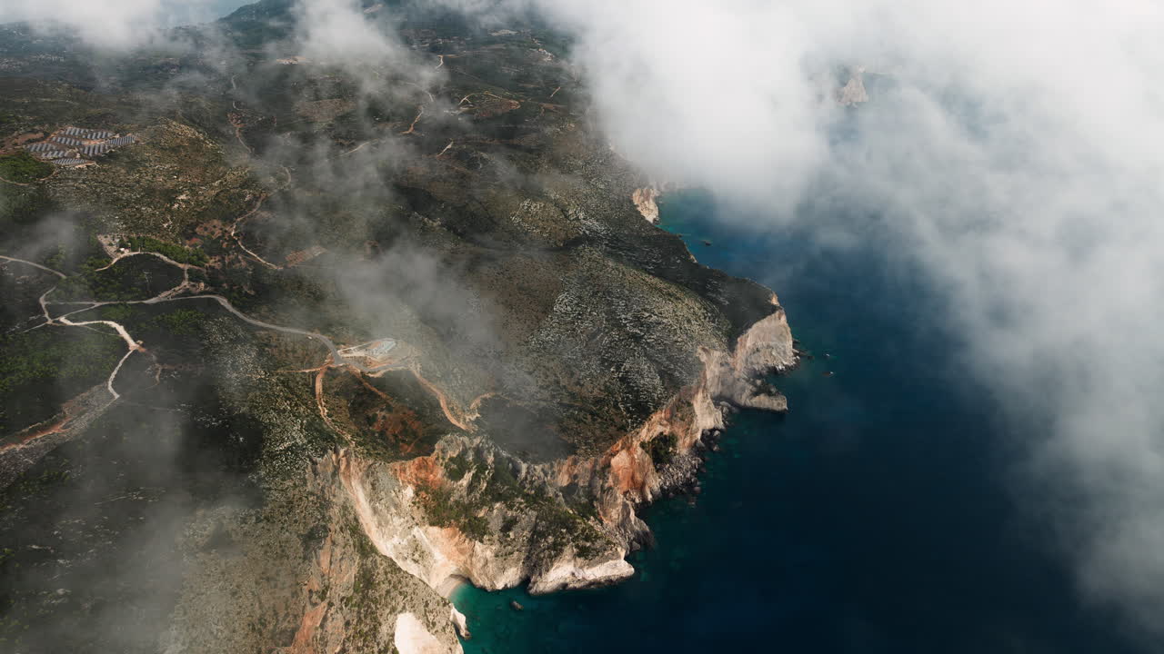 Aerial View of Greek Island Coastline with Fog