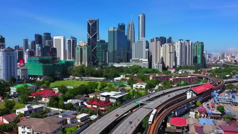 kuala lumpur skyline cityscape and transportation