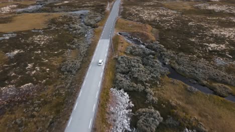 4k 60fps - drone following car over highlands marsh late in the day