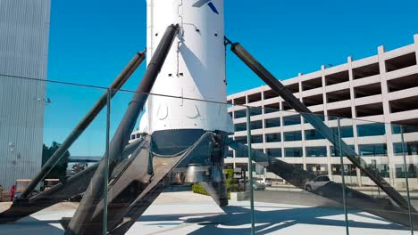 spacex falcon 9 first stage rocket model at spacex hq in hawthorne, california usa pan down shot