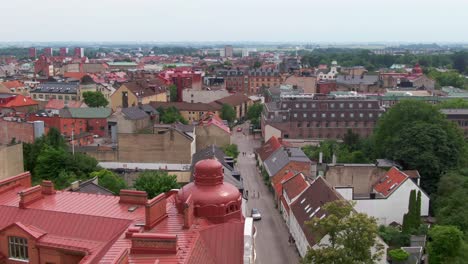 rooftops in central lund near the tree-covered city square clemenstorget