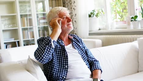 senior man talking on mobile phone