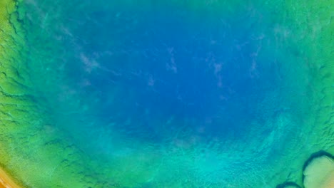 aerial 4k footage of grand prismatic spring in yellowstone national park, wyoming, usa